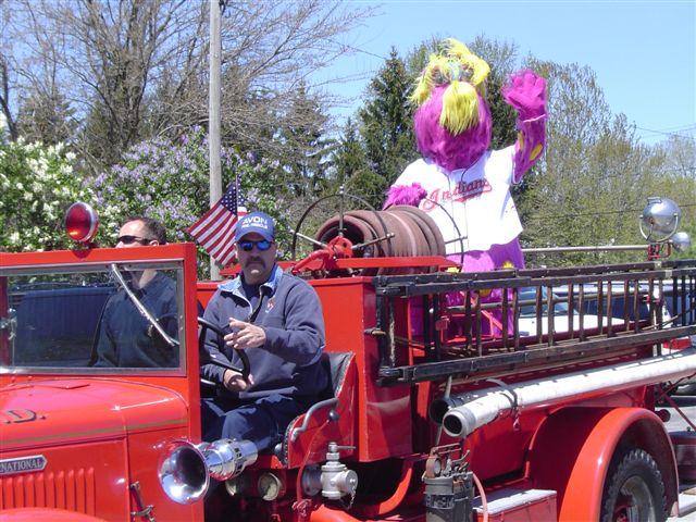 Slider leading-off the parade in the Avon Fire Dept's antique fire truck.